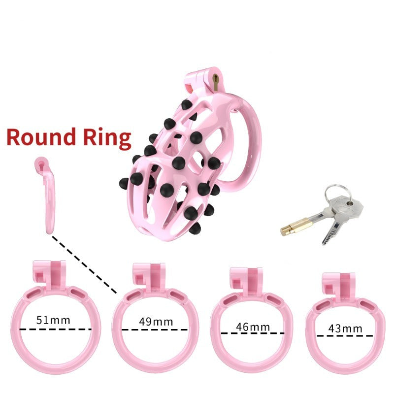 Pink Chastity Cage with 5 Size Penis Rings and Removable Silicone Spikes - KeepMeLocked